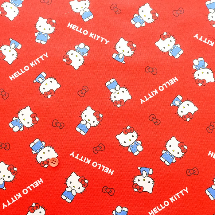 コットンオックスプリント生地　ハローキティ　リボン
