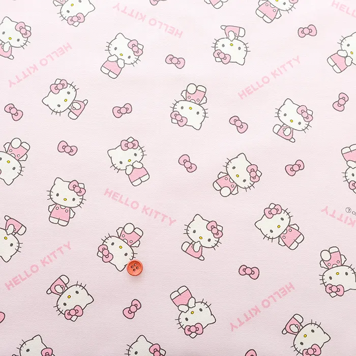 コットンオックスプリント生地　ハローキティ　リボン