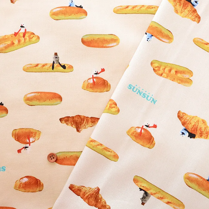 コットンオックスインクジェットプリント生地　PUPPET SUN SUN