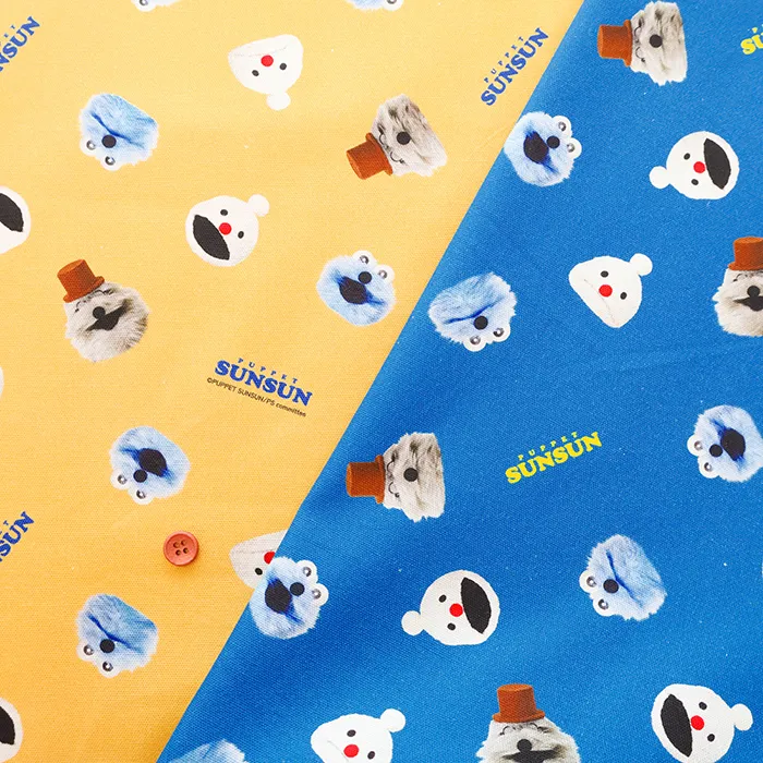 コットンオックスインクジェットプリント生地　PUPPET SUN SUN