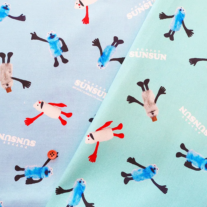コットンオックスインクジェットプリント生地　PUPPET SUN SUN