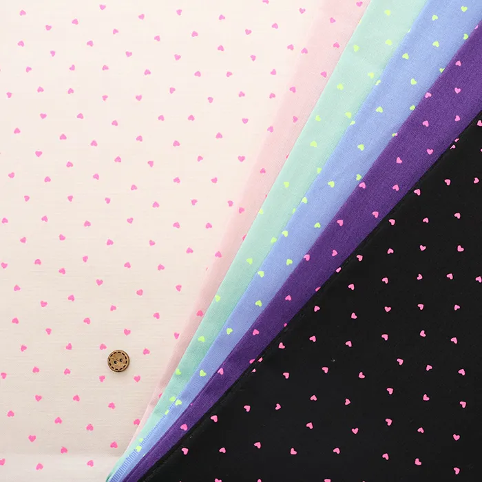 コットンシーチング蛍光プリント生地　プチハート