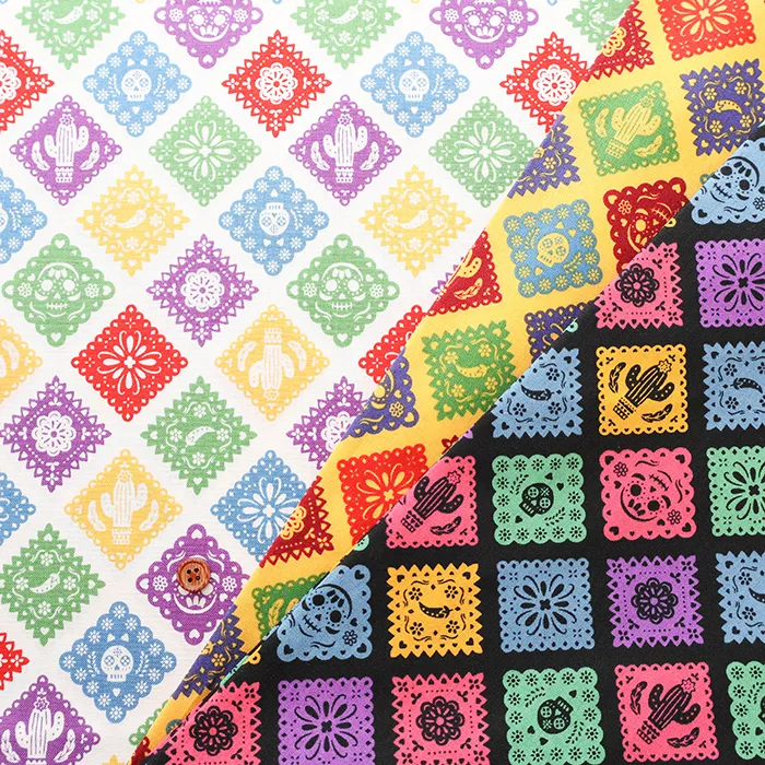 コットンシーチングプリント生地　un/no　メキシコモチーフ