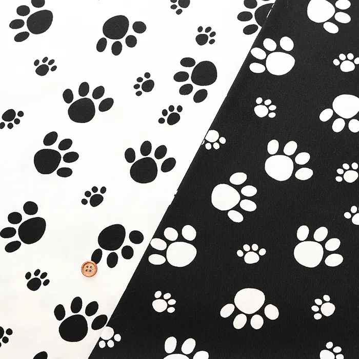 コットンツイルプリント生地　あしあと