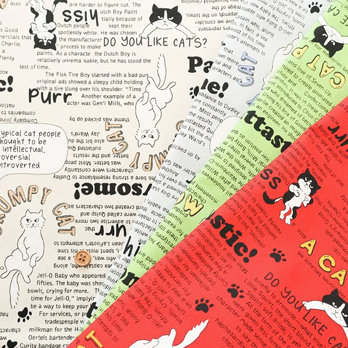 コットンオックスプリント生地　ニャンコニュースペーパー