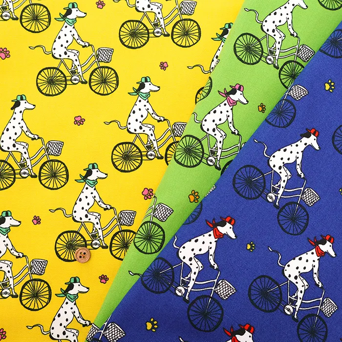 コットンオックスプリント生地　ダルメシアン自転車
