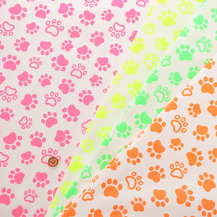 コットンオックスネオンカラープリント生地　足あと