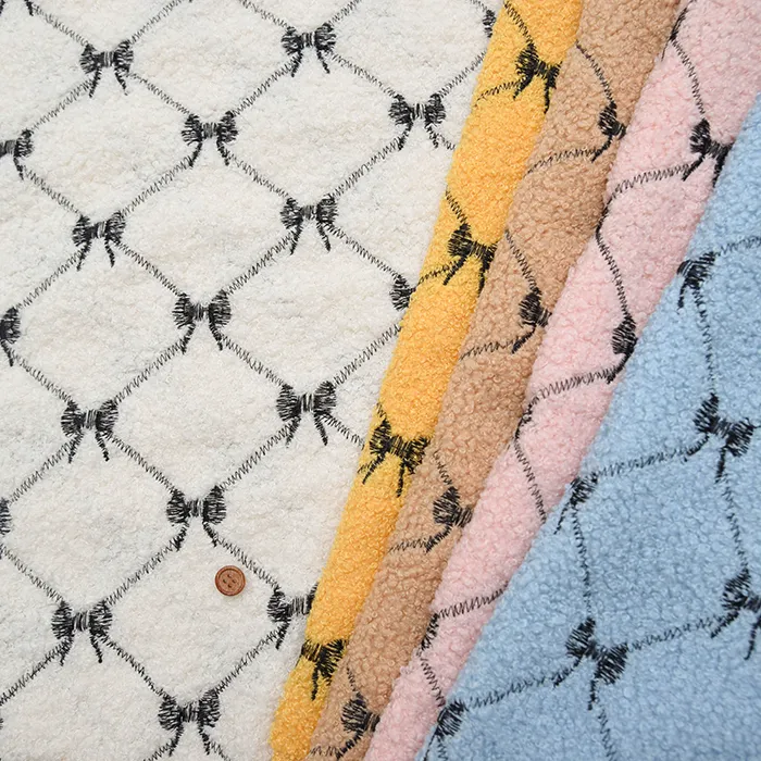 中国製　プードル刺繍生地　リボン