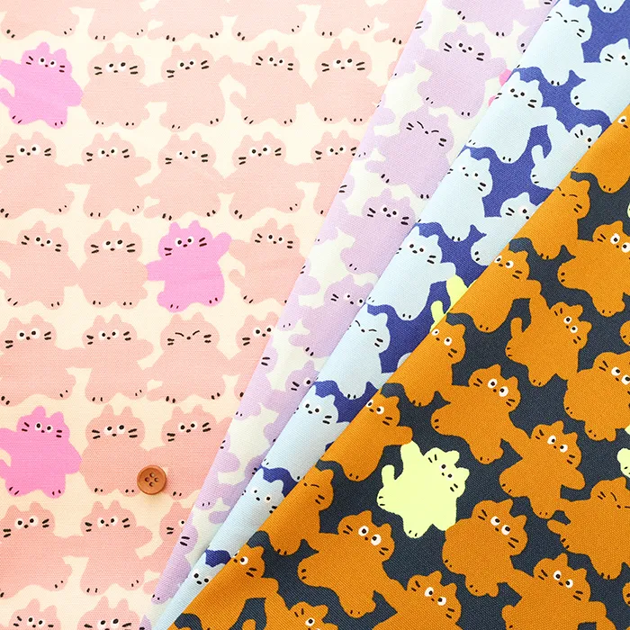 コットンオックスネオンプリント生地　メロウフレンズ　ネコ
