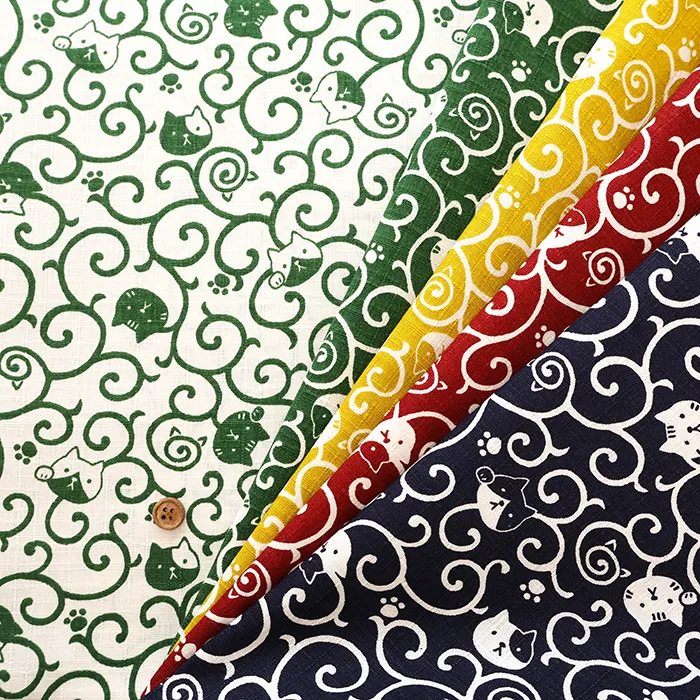 コットンドビープリント生地　唐草ネコ