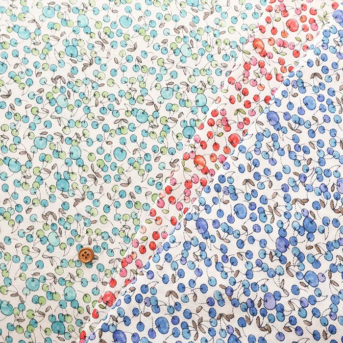 シルケットUV加工　コットン強撚フライスニットプリント生地　リンゴとチェリー