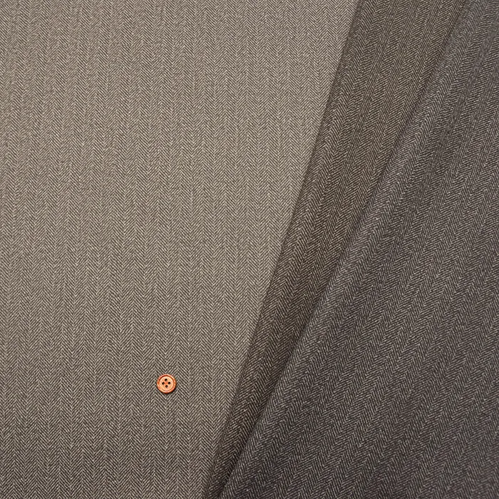 中国製　ポリエステルポンチプリント生地　ヘリンボン