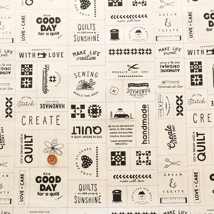 USAコットンプリント生地　THREADS MADE WITE LOVE