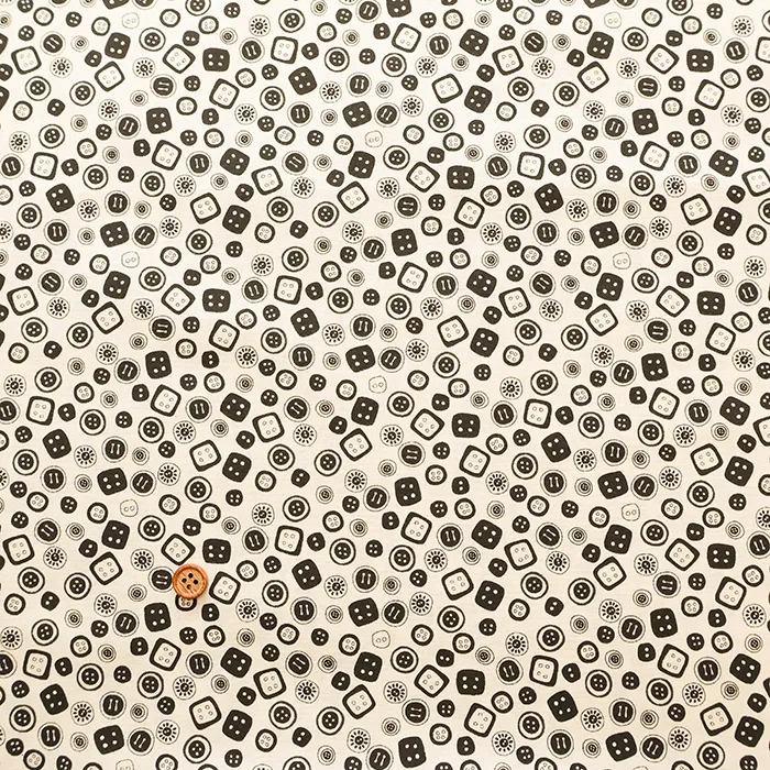 USAコットンプリント生地　THREADS BUTTONS